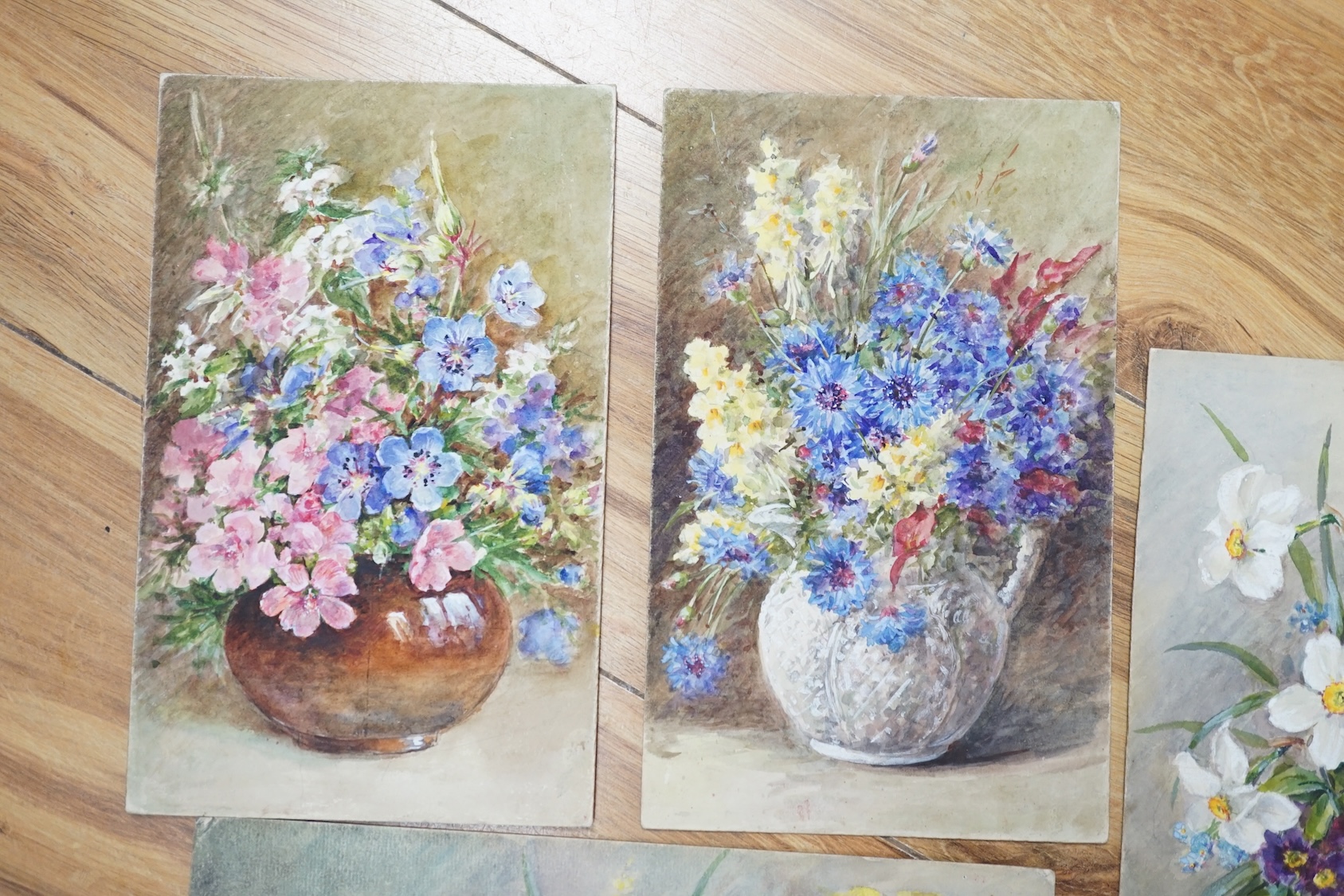 Annie L. Pressland (1862-1933), four watercolours on card, ‘Blue Cranesbill & Musk Mallow’, ‘Daffodils & Mimosa’, Yellow Snapdragons & Cornflowers’ and ‘Narcissi & Auriculas’, one signed, unframed, largest 27 x 17.5cm. C